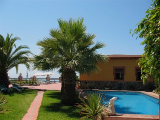 Pool with sunbeds