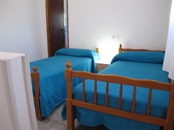 Das zweite Schlafzimmer hat zwei Doppelbetten